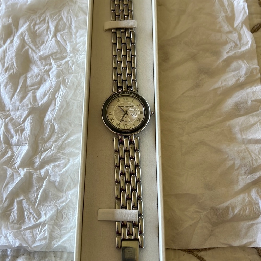 Pierre Balmain Paris Wrist Watch in Silver color with dark blue outer rim color
